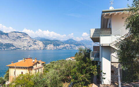 Brenzone 699: Sky, Water, Cloud, Building, Plant, Mountain, Tree, House, Window, Lake