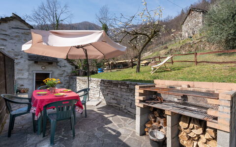 Baita Anita: Sky, Property, Plant, Tree, Outdoor Furniture, Shade, Table, Outdoor Table, Wood, Landscape