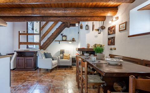 Baita Anita: Table, Furniture, Property, Countertop, Cabinetry, Wood, Kitchen, Chair, Interior Design, Flooring