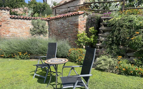 Il Ghiro: Plant, Property, Furniture, Nature, Table, Outdoor Table, Chair, Tree, Natural Landscape, Outdoor Furniture