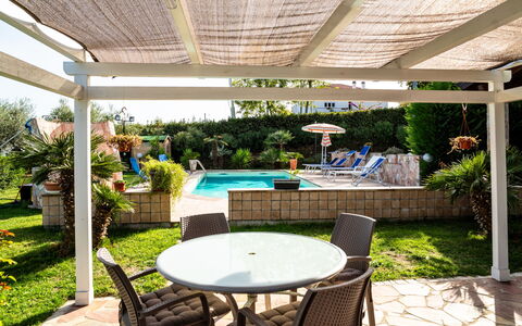 Rêve D'Or: Plant, Furniture, Table, Chair, Shade, Outdoor Furniture, Outdoor Table, Building, Leisure, Real Estate