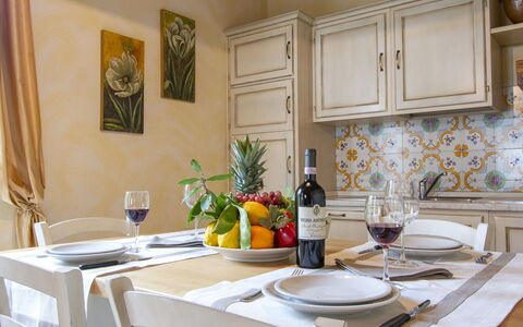 L' Ulivo: Property, Furniture, Tableware, Cabinetry, Plant, Countertop, Kitchen, Dishware, Building, Interior Design