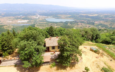 Caiano: Sky, Plant, Plant Community, Building, Mountain, Tree, Highland, Natural Landscape, Land Lot, Mountainous Landforms