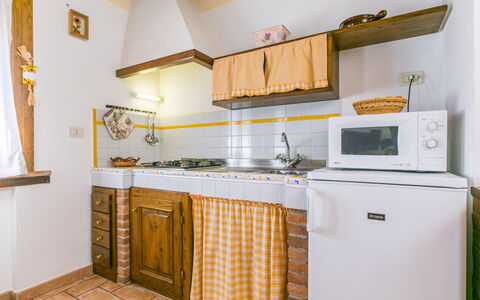 Suvereto 649: Cabinetry, Countertop, Property, Kitchen, Kitchen Appliance, Home Appliance, Wood, Kitchen Stove, Lighting, Sink