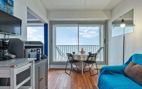 Les Sables D'Argent: Furniture, Floor, Room, Apartment, Chair, Sea, Balcony, Hardwood, Resort, Wood Flooring
