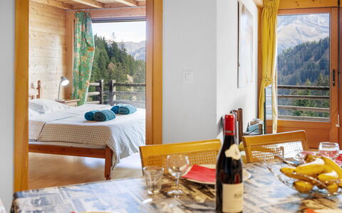 Les Crosets 606: Furniture, Tableware, Property, Table, Bottle, Drinkware, Interior Design, Textile, Tablecloth, Wood
