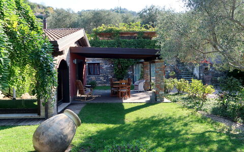 Villa Monterosso (Imp420): Plant, Sky, Building, Tree, Shade, Grass, Natural Landscape, House, Shrub, Leisure