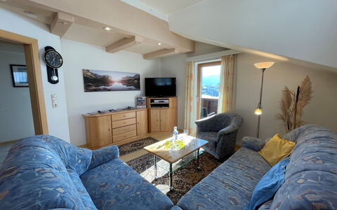 Fill: Picture Frame, Furniture, Comfort, Television, Table, Couch, Building, Wood, Lamp, Lighting