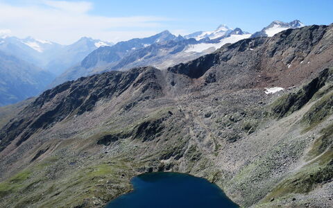 Pult: Mountain, Sky, Water, Cloud, Natural Landscape, Slope, Terrain, Lake, Landscape