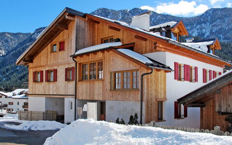 Mantel: Sky, Mountain, Building, Snow, Property, Window, House, Slope, Freezing, Wood