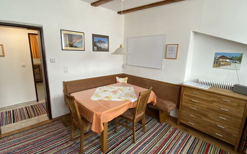 Sonja: Table, Furniture, Picture Frame, Building, Wood, Interior Design, Flooring, Floor, Wood Stain, Wall