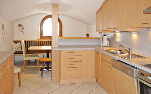 Unterkreuter: Countertop, Property, Room, Kitchen, Furniture, Cabinetry, Building, Interior Design, Floor, Architecture