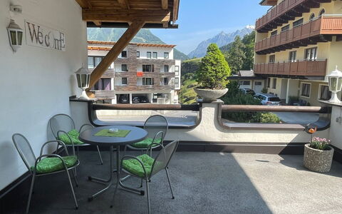 Sölden 723: Plant, Building, Furniture, Property, Sky, Table, Window, Chair, Flowerpot, Houseplant