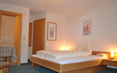 Gaugg: Furniture, Property, Comfort, Light, Building, Wood, Textile, Orange, Interior Design, Lighting