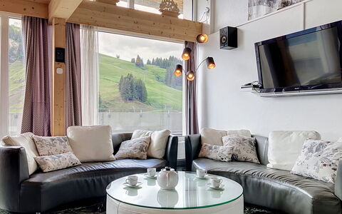 Les Cimes: Furniture, Interior Design, Couch, Living Room, Ceiling, Home, Lighting, Flooring, Apartment, Room