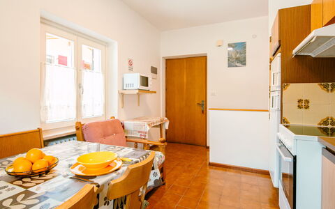 Pederiva (Sof740): Table, Property, Furniture, Cabinetry, Wood, Chair, Orange, Interior Design, Building, Door