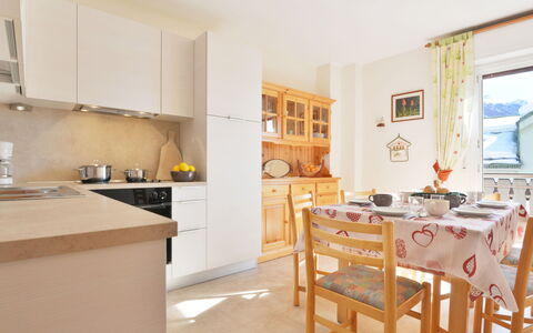 Ghetta: Cabinetry, Furniture, Window, Countertop, Kitchen, Wood, Chair, Picture Frame, Table, Interior Design