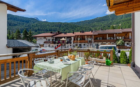 Sölden 731: Sky, Table, Property, Cloud, Furniture, Plant, Flowerpot, Building, Chair, Outdoor Furniture