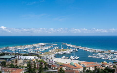 Terre Bianche: Sky, Sea, Coast, Azure, Town, Ocean, Bay, Tourism, Horizon, Vacation
