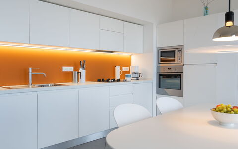 Terre Bianche: Room, Countertop, Property, Interior Design, Furniture, Kitchen, Yellow, Cabinetry, Orange, House