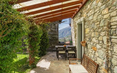 Marcello: Plant, Property, Building, Furniture, Table, Shade, Wood, Chair, Tree, Cottage