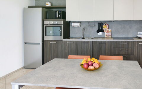 Gera Lario 618: Cabinetry, Countertop, Table, Property, Furniture, Food, Tableware, Kitchen Stove, Kitchen, Kitchen Appliance