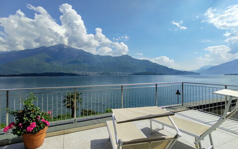 Gera Lario 618: Cloud, Water, Sky, Plant, Mountain, Property, Flower, Flowerpot, Fence, Lake