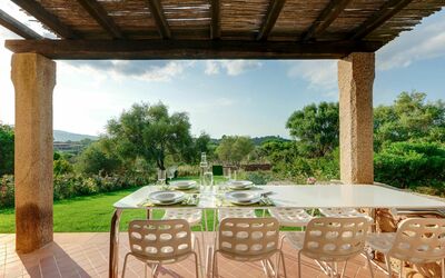 San Teodoro 733: Plant, Cloud, Sky, Property, Furniture, Nature, Shade, Chair, Lighting, Wood