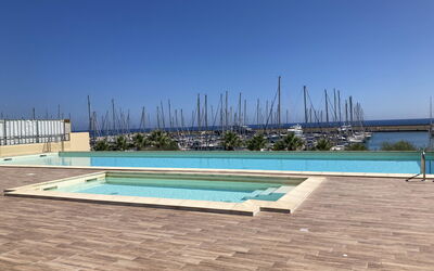 Santo Stefano al Mare 616: Water, Sky, Water Resources, Azure, Rectangle, Building, Swimming Pool, Plant, Composite Material, Roof
