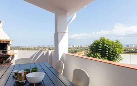 Sascha: Sky, Building, Furniture, Table, Shade, Cloud, Wood, Interior Design, Chair, Plant