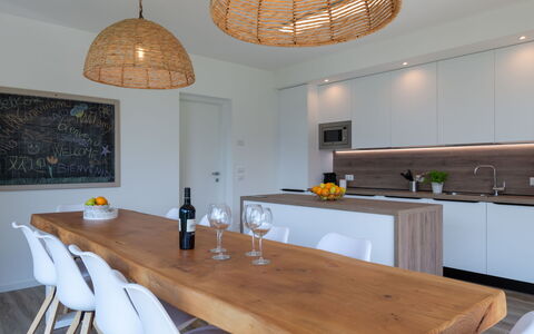 Brezza di Lago: Table, Property, Furniture, Wood, Cabinetry, Countertop, Lighting, Interior Design, Kitchen, Chair