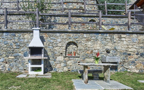 Residenza la Sassicaia: Plant, Building, Window, Tree, Grass, Wood, Door, Wall, Cottage, Brick