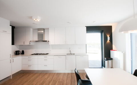 Oesterdam Resort: Cabinetry, Building, Furniture, Countertop, Wood, Kitchen, Drawer, Flooring, Floor