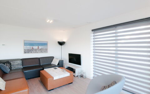 Oesterdam Resort: Furniture, Property, Couch, Television, Comfort, Window Blind, Interior Design, Living Room, Architecture, Floor