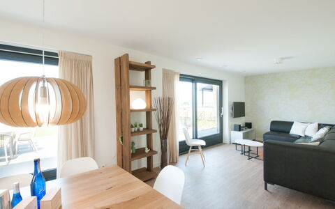 Oesterdam Resort: Table, Furniture, Property, Couch, Chair, Wood, Comfort, Interior Design, Floor, Drawer