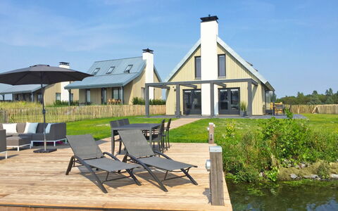 Oesterdam Resort: Sky, Water, Plant, Property, Window, Cloud, Land Lot, Building, Shade, Cottage