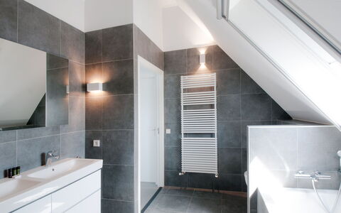 Oesterdam Resort: Mirror, Building, Bathroom Cabinet, Sink, Cabinetry, Wood, Tap, Lighting, Interior Design, Flooring