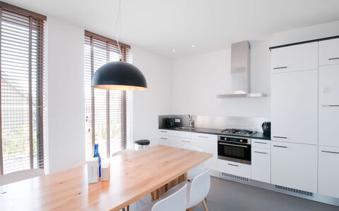Oesterdam Resort: Cabinetry, Property, Countertop, Table, Wood, Kitchen, Interior Design, Architecture, Kitchen Appliance, Floor