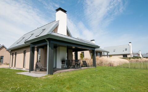 Oesterdam Resort: Furniture, Table, Building, Chair, Tableware, Cloud, Sky, Tablecloth, Outdoor Furniture, Shade