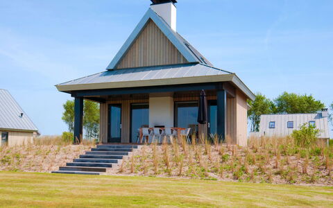 Oesterdam Resort: House, Home, Property, Cottage, Building, Real Estate, Roof, Architecture, Grass, Farmhouse