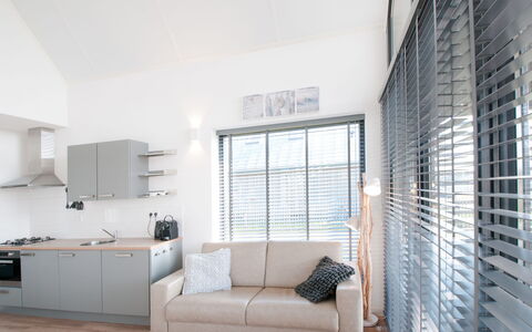 Oesterdam Resort: Room, Property, Furniture, Interior Design, Living Room, Building, Floor, Wall, House, Ceiling