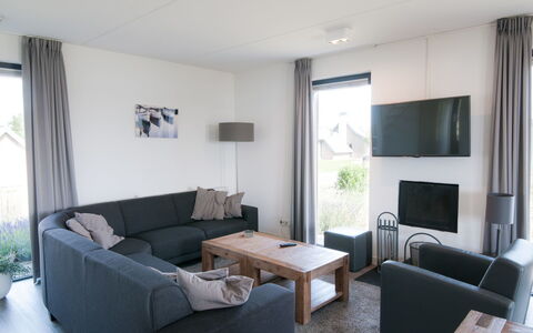 Oesterdam Resort: Living Room, Furniture, Room, Property, Interior Design, Building, Couch, Coffee Table, House, Table
