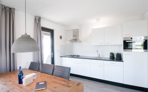 Oesterdam Resort: Room, Property, Furniture, Kitchen, Countertop, Interior Design, Building, House, Floor, Cabinetry