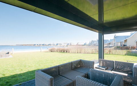 Oesterdam Resort: Property, Architecture, Room, Real Estate, Interior Design, Shade, Building, House, Porch, Grass