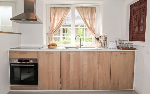 Gwenn: Cabinetry, Countertop, Property, Window, Kitchen, Wood, Interior Design, Lighting, Floor