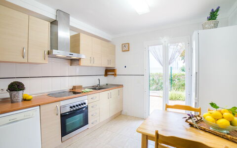 Les Savines: Room, Property, Kitchen, Furniture, Yellow, Interior Design, Cabinetry, Countertop, Building, House