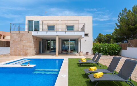 Villa Mut: Sky, Furniture, Building, Cloud, Plant, Window, Azure, Blue, Shade, Outdoor Furniture