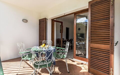 Sa Riera 603: Furniture, Building, Table, Wood, Chair, Door, Interior Design, Living Room, Shade, Window