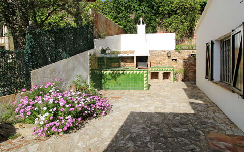Catalonia: Plant, Flower, Building, Tree, Grass, Landscape, Sky, Shrub, Groundcover, Window