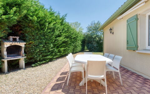 Les Lavandiers: Window, Plant, Property, Furniture, Sky, Table, Building, Road Surface, Shade, Land Lot